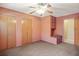 Carpeted bedroom with fan at 1470 Biltmore Ne Dr, Atlanta, GA 30329