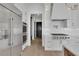 Updated kitchen features stainless appliances, modern hardware, and plenty of cabinet space at 2875 Caney Parc Way, Cumming, GA 30041