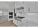Well-equipped kitchen with stainless steel appliances, double ovens and sleek countertops at 2875 Caney Parc Way, Cumming, GA 30041