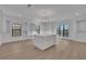 Spacious walk-in closet with built-in shelving and a center island for ample storage at 2875 Caney Parc Way, Cumming, GA 30041