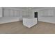 Large walk-in closet featuring custom shelving and a center island at 2875 Caney Parc Way, Cumming, GA 30041