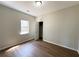 Bright bedroom featuring a window and large closet at 2910 Treehouse Ln, Lawrenceville, GA 30044