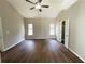 Open and spacious main bedroom with vaulted ceiling and a ceiling fan at 2910 Treehouse Ln, Lawrenceville, GA 30044