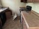 Functional kitchen space with appliances and ample countertop space, ready for updates at 6127 Pinegrove Rd, Riverdale, GA 30274
