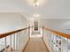Hallway featuring carpet flooring and white wood railing along the side at 2123 Tigger Ne Trce, Marietta, GA 30066