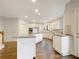 Spacious white kitchen with a large island, stainless steel appliances, and ample cabinet space at 2123 Tigger Ne Trce, Marietta, GA 30066