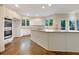 Spacious kitchen featuring white cabinets, stainless appliances, and a large center island at 2123 Tigger Ne Trce, Marietta, GA 30066