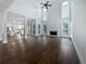 Living room with dark wood floors, high ceilings, and a fireplace at 2123 Tigger Ne Trce, Marietta, GA 30066