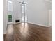 Spacious living room with tall windows, fireplace, hardwood floors, and a vaulted ceiling at 2123 Tigger Ne Trce, Marietta, GA 30066