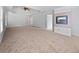 Large carpeted main bedroom with a ceiling fan and fireplace at 2123 Tigger Ne Trce, Marietta, GA 30066