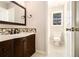 Bathroom featuring single vanity and tiled backsplash at 3707 Mcguire Nw St, Kennesaw, GA 30144