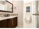 Updated bathroom features a modern vanity with stylish finishes and a tile backsplash at 3707 Mcguire Nw St, Kennesaw, GA 30144