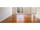 Bright room features hardwood floors and large windows at 3707 Mcguire Nw St, Kennesaw, GA 30144