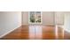 Spacious living room featuring sleek wood floors and plenty of natural light at 3707 Mcguire Nw St, Kennesaw, GA 30144