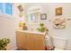 Well-lit bathroom showcasing a vanity, decor, and a toilet at 377 Ralph Mcgill Ne Blvd # H, Atlanta, GA 30312