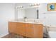 Bathroom featuring double sinks, a mirror, and neutral wall color at 377 Ralph Mcgill Ne Blvd # H, Atlanta, GA 30312