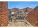 Relaxing outdoor deck area with brick walls, potted plants, and seating at 377 Ralph Mcgill Ne Blvd # H, Atlanta, GA 30312