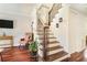 Inviting entryway with hardwood floors, elegant staircase, and neutral decor at 377 Ralph Mcgill Ne Blvd # H, Atlanta, GA 30312