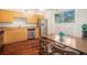 A bright kitchen with stainless steel appliances and hardwood flooring at 377 Ralph Mcgill Ne Blvd # H, Atlanta, GA 30312