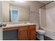 Bright bathroom featuring a vanity with storage, toilet, and shower-tub combination at 4097 Rosebud Park Dr, Snellville, GA 30039