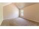 A bedroom with carpet flooring, neutral walls and a window at 4097 Rosebud Park Dr, Snellville, GA 30039