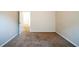 A bedroom with carpet flooring and light gray walls at 4097 Rosebud Park Dr, Snellville, GA 30039