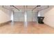 Spacious two-car garage with ample room for parking and storage, includes insulated garage doors at 4097 Rosebud Park Dr, Snellville, GA 30039