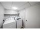 Functional basement area featuring a washer and dryer, offering convenient laundry amenities at 468 Windol Ct, Marietta, GA 30066