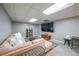 Spacious basement with comfortable seating and a modern entertainment center at 468 Windol Ct, Marietta, GA 30066