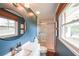Stylish bathroom features a glass-enclosed shower, sleek vanity, and natural light for a fresh feel at 468 Windol Ct, Marietta, GA 30066