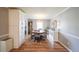 Dining room with hardwood floors, round table, and a white buffet at 468 Windol Ct, Marietta, GA 30066