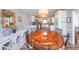 Dining room with hardwood floors, round table, and a white buffet at 468 Windol Ct, Marietta, GA 30066