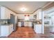 Bright kitchen with stainless steel appliances, granite countertops, and ample cabinet space at 468 Windol Ct, Marietta, GA 30066