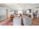 The expansive living room features hardwood floors, neutral walls, and transitions to dining and entry areas at 468 Windol Ct, Marietta, GA 30066