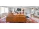 The open-concept living room has hardwood floors and an easy transition to the kitchen and dining areas at 468 Windol Ct, Marietta, GA 30066