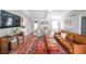 Cozy living room with hardwood floors, leather couch, decorative rug and fireplace at 468 Windol Ct, Marietta, GA 30066