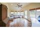 Bright sun room with hardwood floors, ceiling fan, and ample seating at 468 Windol Ct, Marietta, GA 30066