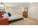 Bedroom featuring wood floors, closet space and neutral wall color at 788 Old Paper Mill Dr, Marietta, GA 30067