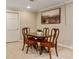 Dining room features a four seat table, wood chairs and carpet at 788 Old Paper Mill Dr, Marietta, GA 30067