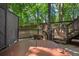 Relax and unwind in this secluded deck area, with an inviting hot tub, perfect for outdoor entertaining at 788 Old Paper Mill Dr, Marietta, GA 30067