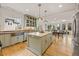 Spacious kitchen with a large island, stainless appliances, and open to the living area at 788 Old Paper Mill Dr, Marietta, GA 30067