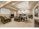 Carpeted living room featuring comfortable furniture and window at 788 Old Paper Mill Dr, Marietta, GA 30067