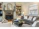 Cozy living area with fireplace, built-in bookshelves, and inviting furnishings at 788 Old Paper Mill Dr, Marietta, GA 30067