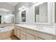 Bathroom featuring double sinks, a soaking tub and plenty of counter space at 3317 Regent Sw Pl, Atlanta, GA 30311