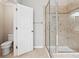 Bathroom featuring a glass shower and neutral tile work at 3317 Regent Sw Pl, Atlanta, GA 30311