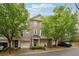 Beautiful brick townhome featuring attached garages and professionally landscaped grounds at 3317 Regent Sw Pl, Atlanta, GA 30311