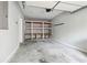 Clean garage featuring built-in shelving and ample storage space at 3317 Regent Sw Pl, Atlanta, GA 30311