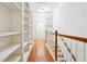 Hallway featuring custom built-in shelving at 3317 Regent Sw Pl, Atlanta, GA 30311