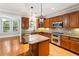 Spacious kitchen featuring an island and modern stainless steel appliances at 3317 Regent Sw Pl, Atlanta, GA 30311