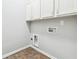 A laundry room shows storage above the appliances and tile floors at 3317 Regent Sw Pl, Atlanta, GA 30311